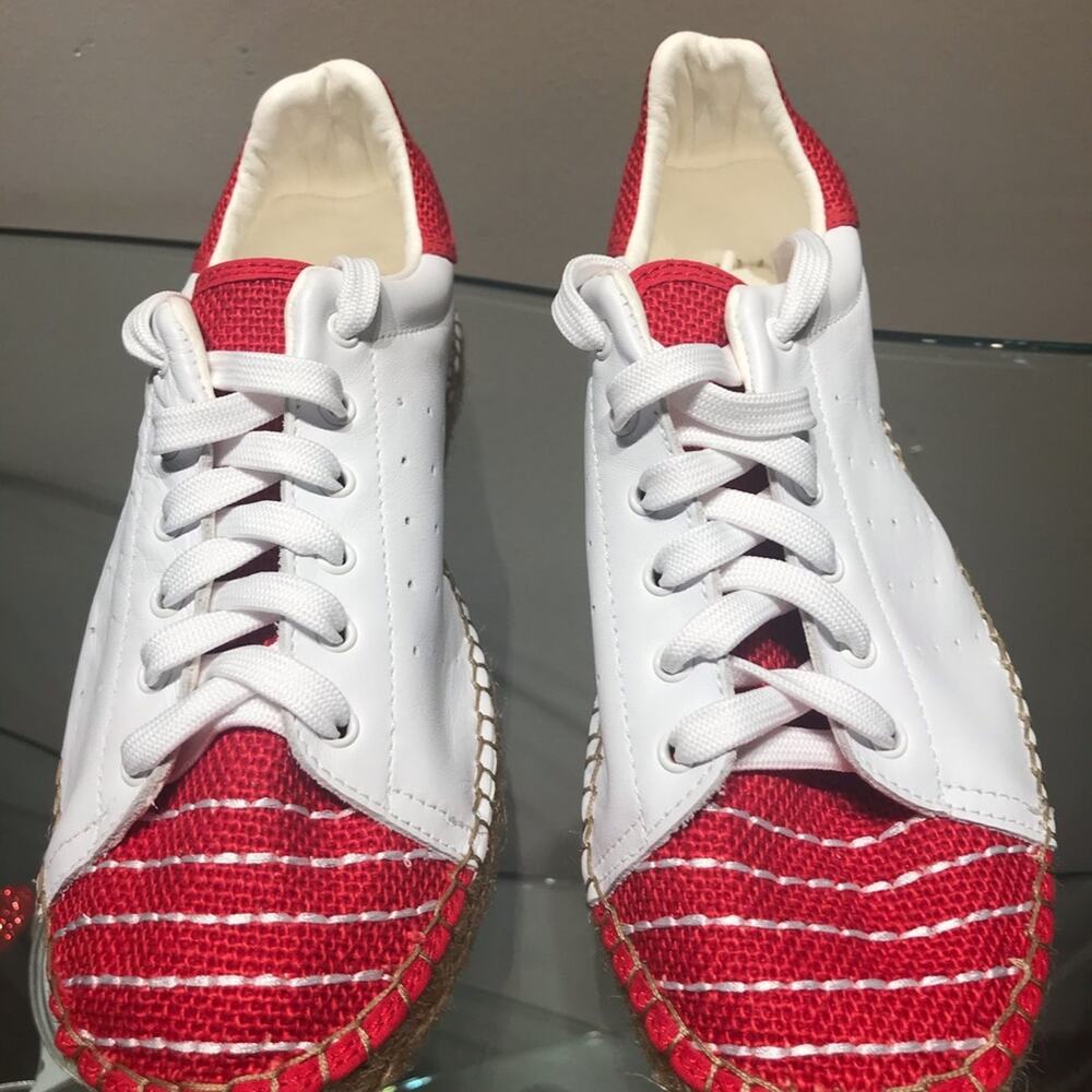 Andrew Stevens red and white raffia toe sneaker